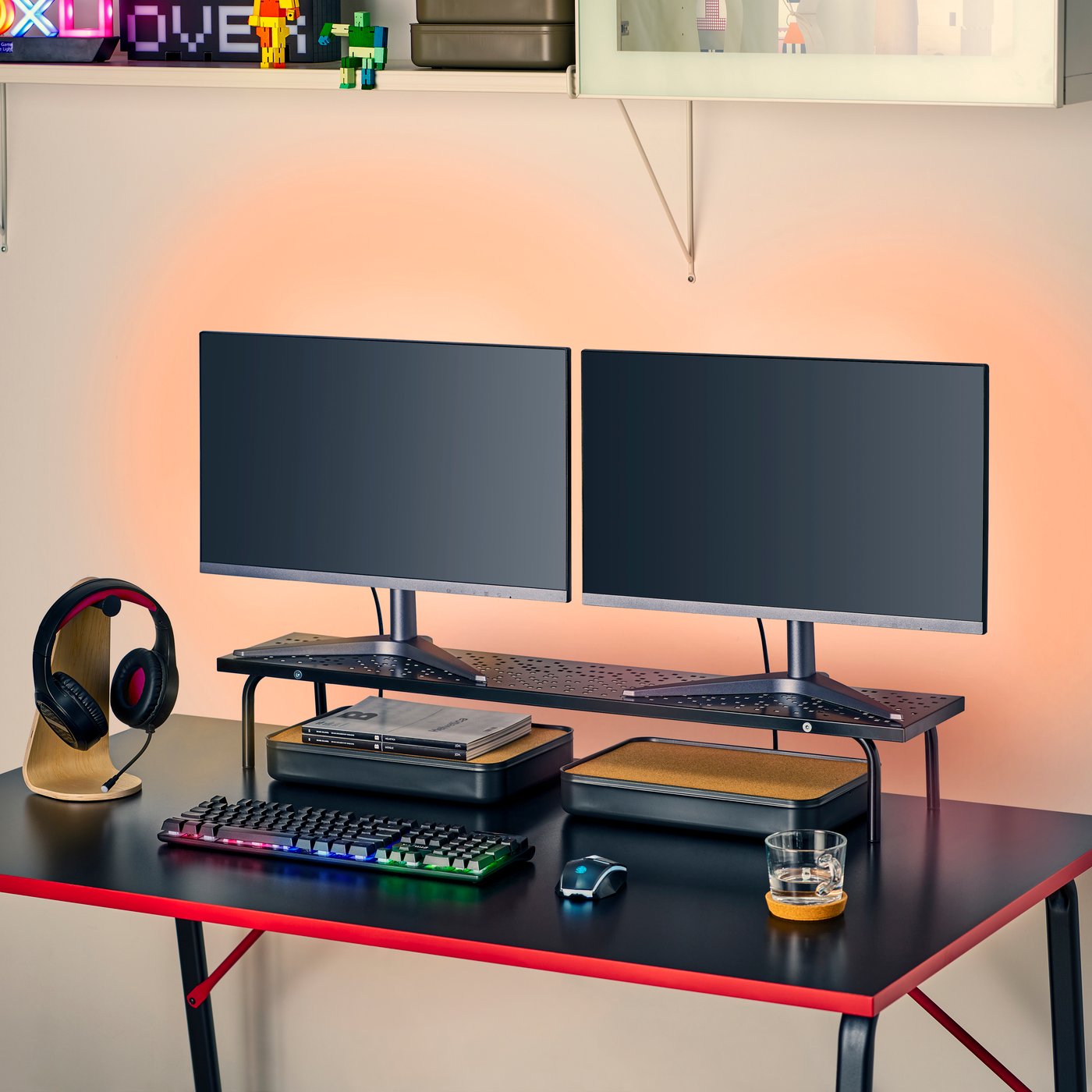 A black LÅNESPELARE monitor stand