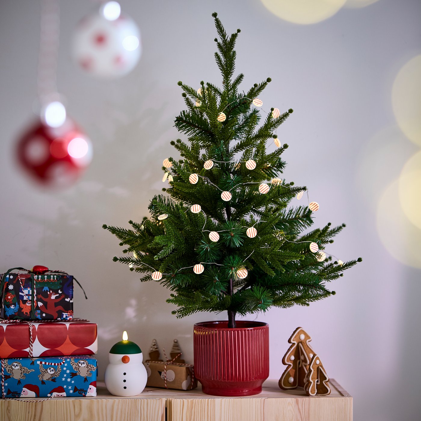 An in/outdoor/Christmas tree green VINTERFINT artificial potted plant