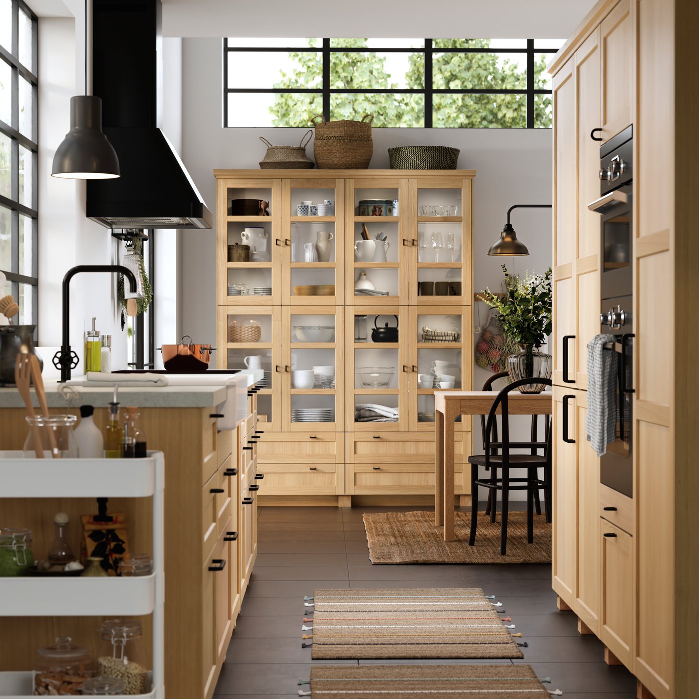 An oak FORSBACKA glass door in the kitchen