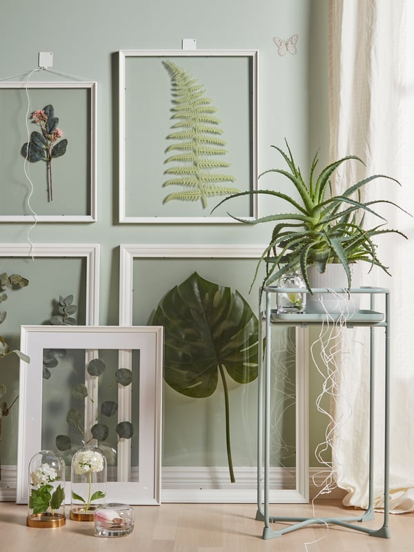EDSBRUK frame positioned on the floor with pressed leafs