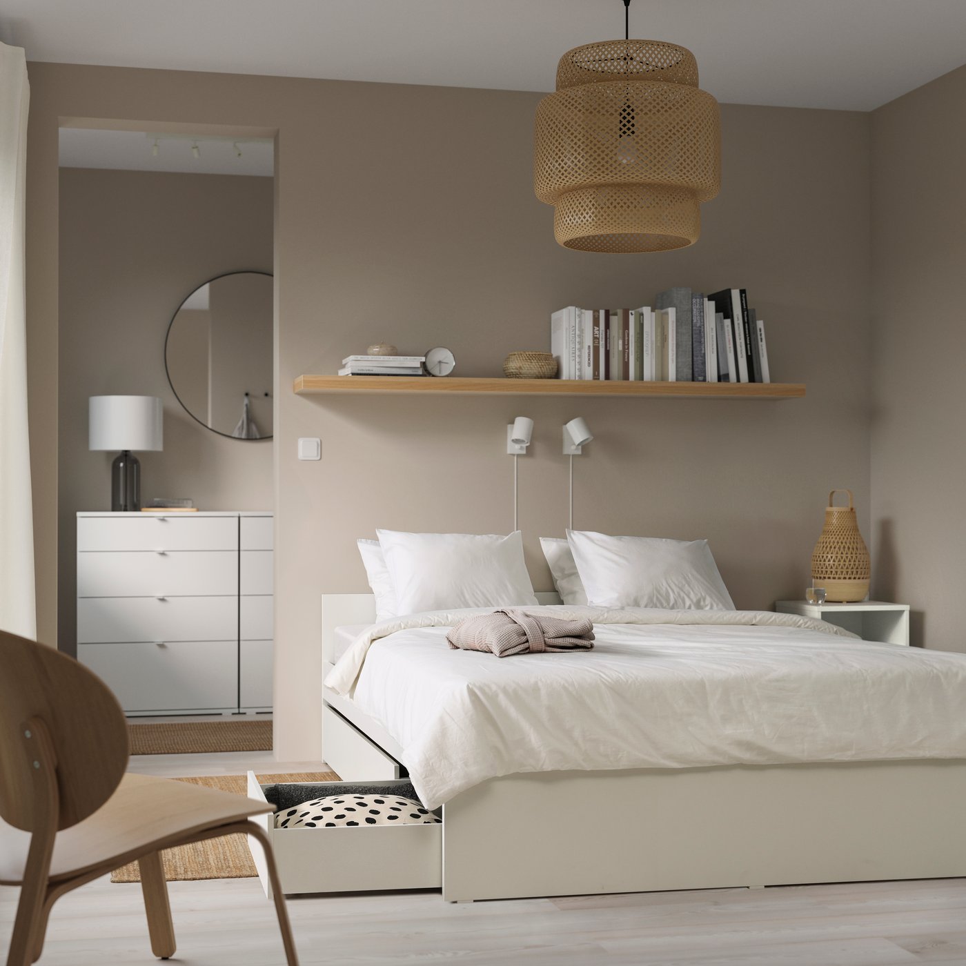 A white/Luröy VIHALS bed frame with 2 storage boxes in the bedroom