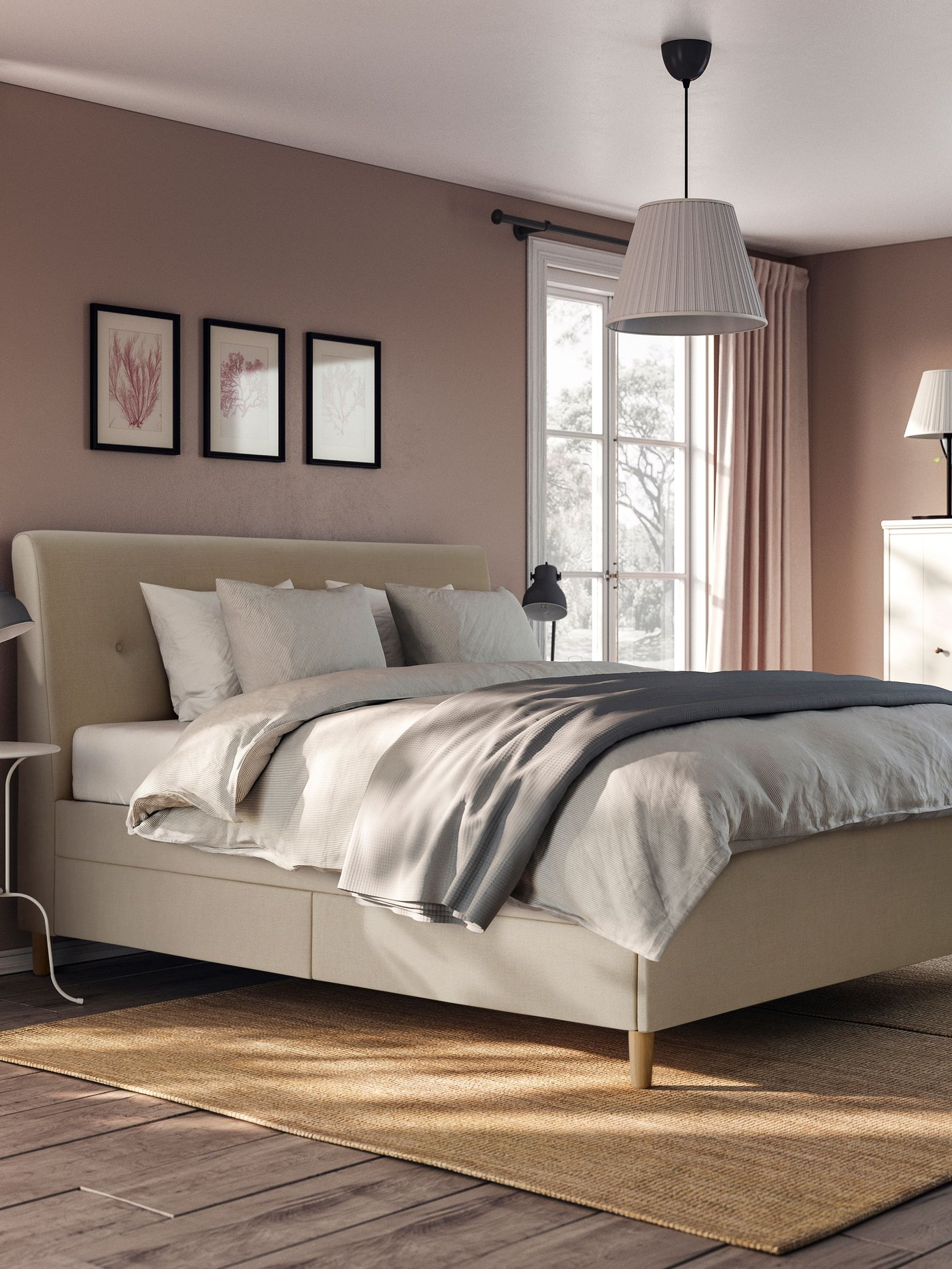 A Naggen beige IDANÄS upholstered storage bed in the bedroom