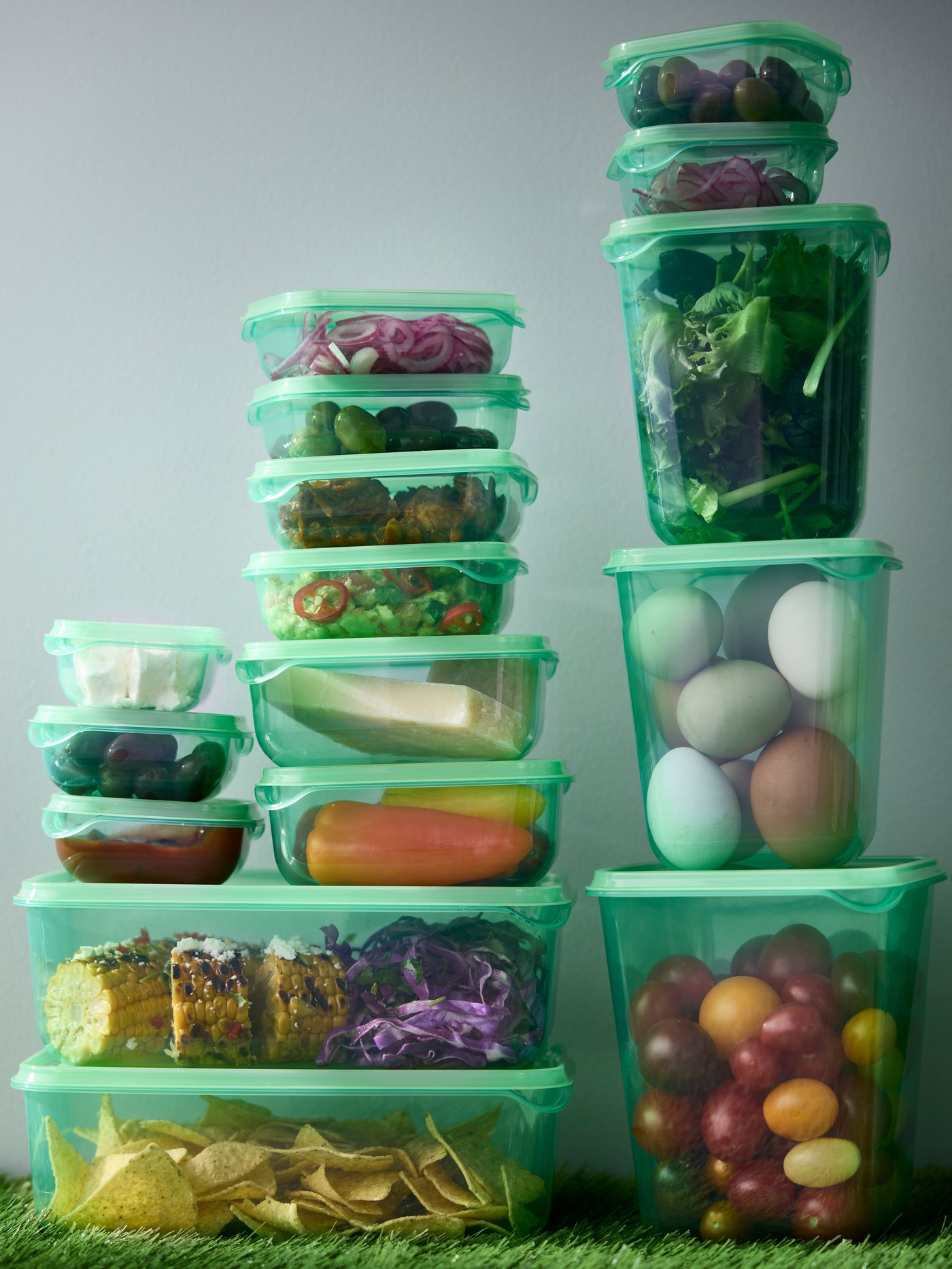 A green PRUTA food container with lid in the NA