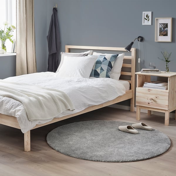 A pine TARVA bed frame