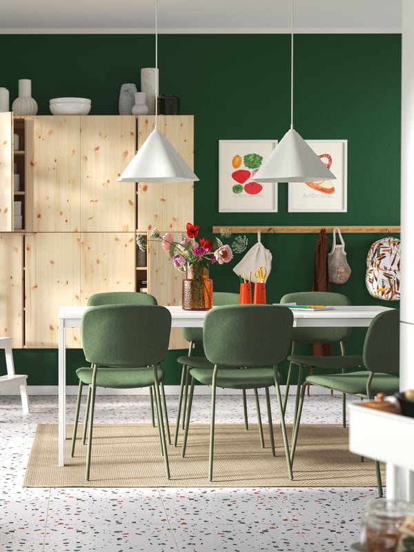 A white/plastic ZEBRASÄV pendant lamp in the dining room