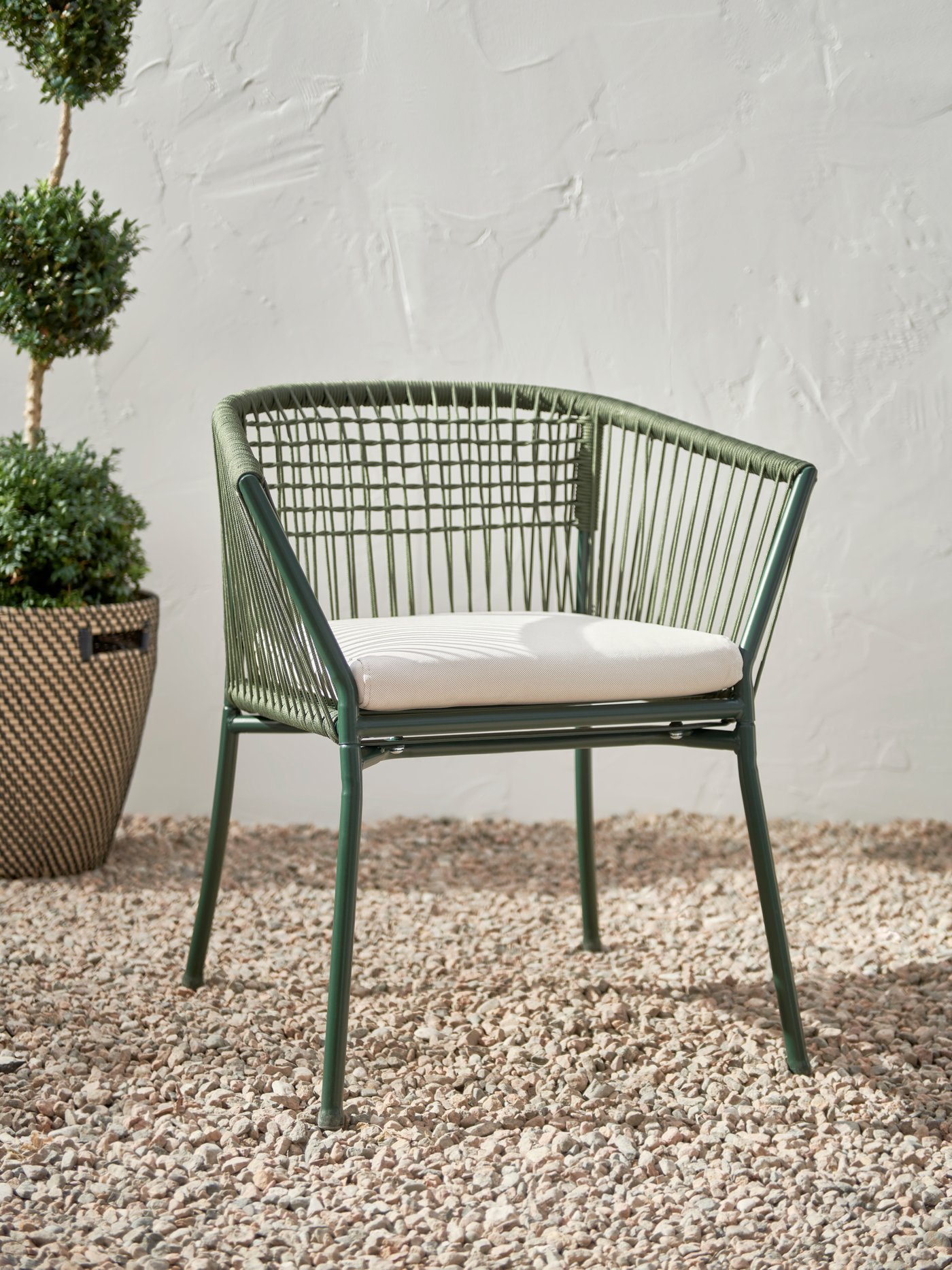 An outdoor beige FRÖSÖN cover for chair cushion