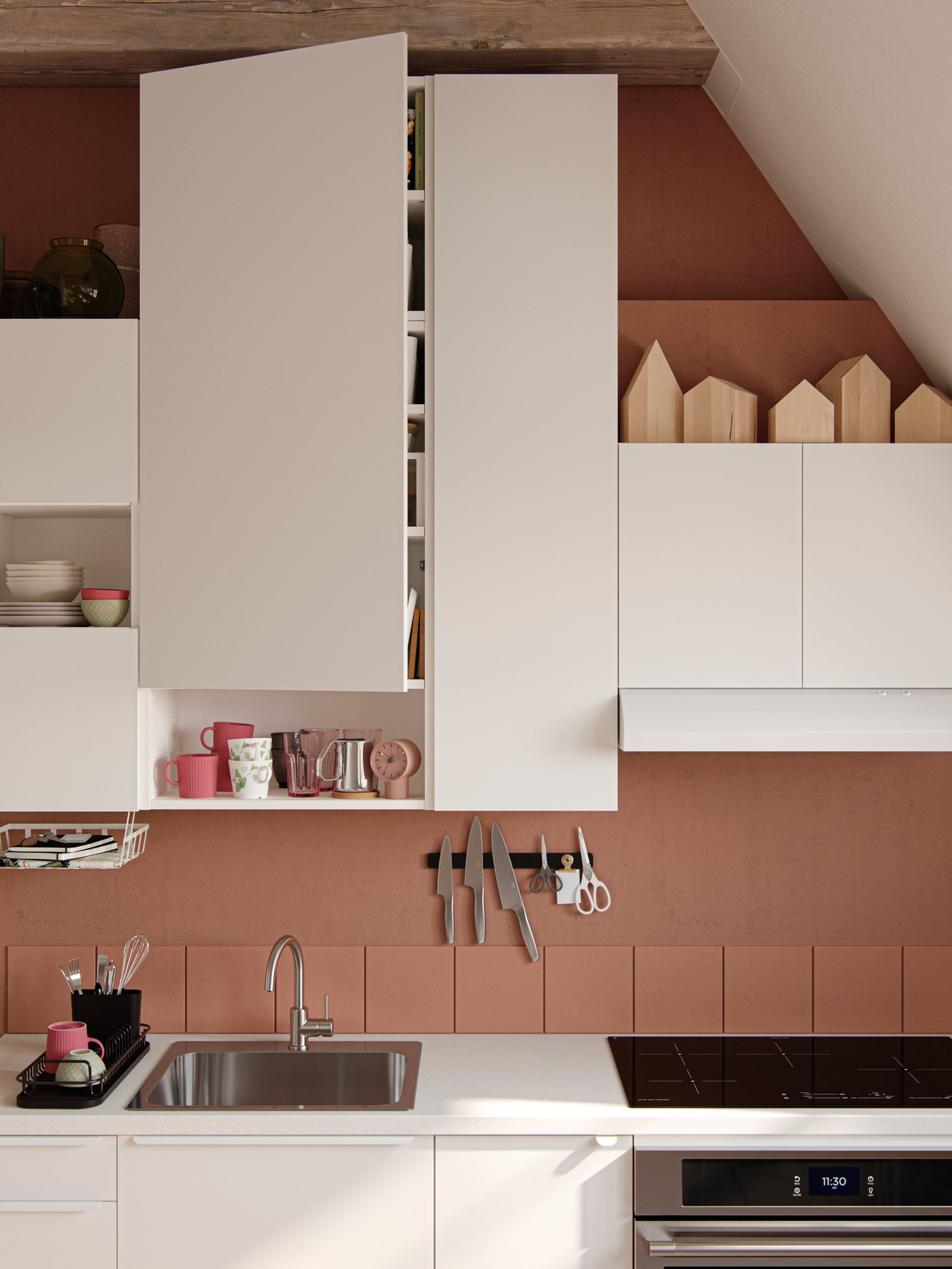 A stainless steel TÄNGBY wall oven with self-cleaning