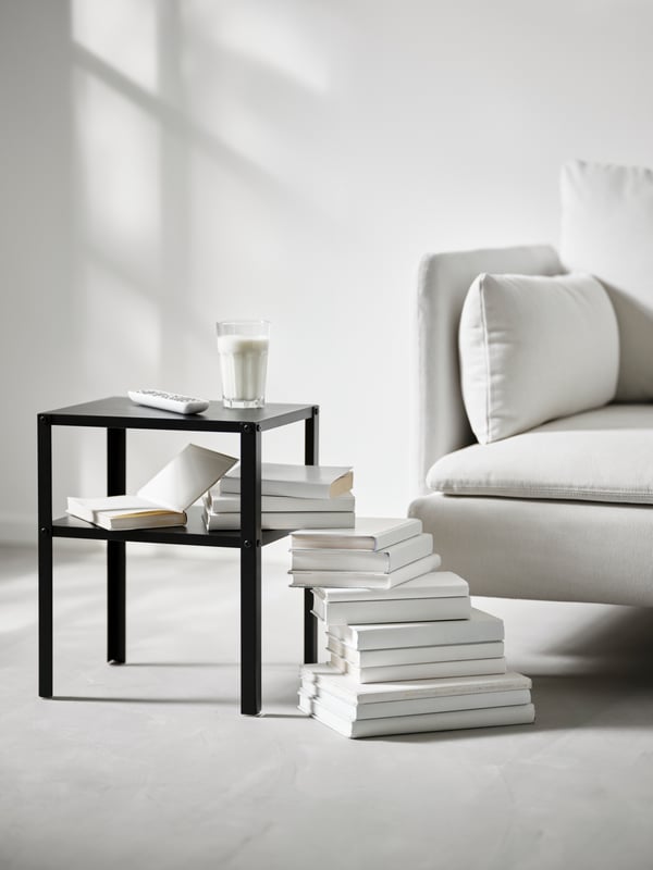 A black KNARREVIK bedside table in the home office