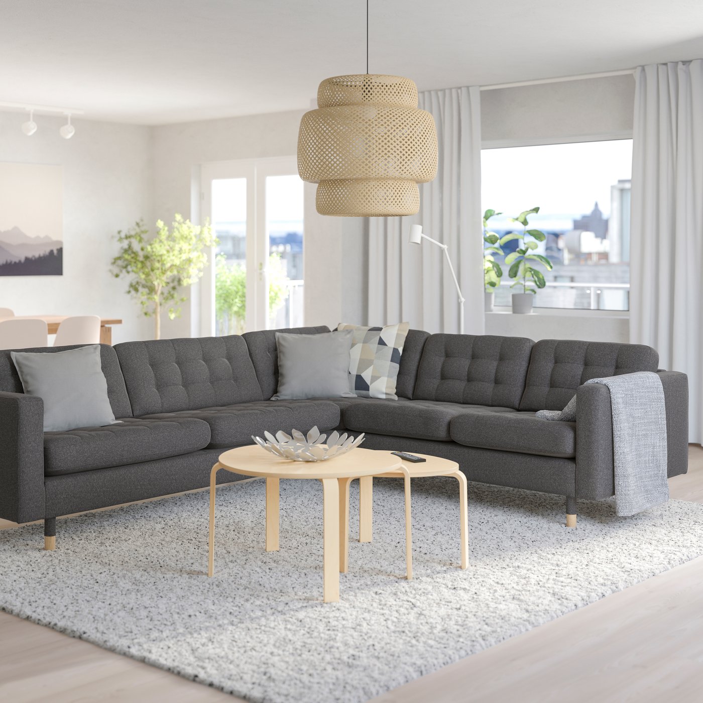 A Gunnared dark grey/wood MORABO corner sofa, 5-seat in the living room