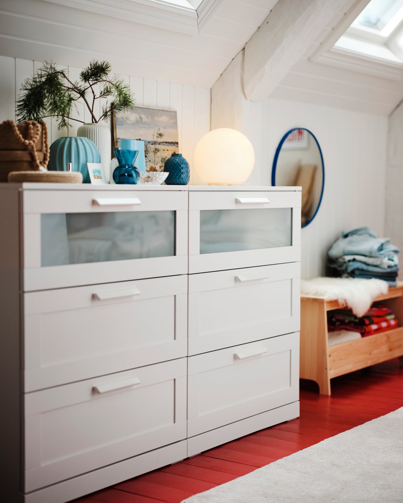 A blue LINDBYN mirror in the bedroom