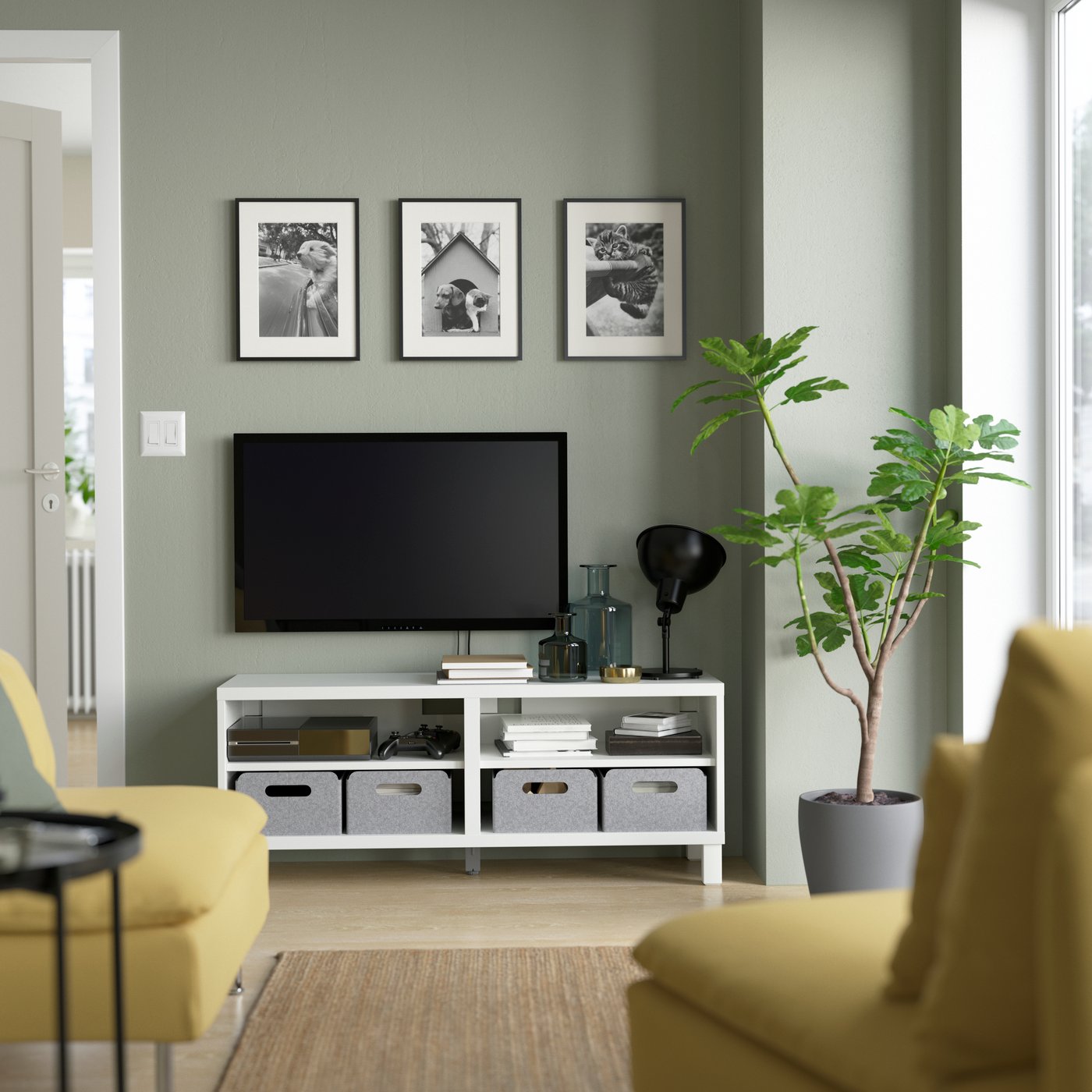 A white BESTÅ TV bench in the living room