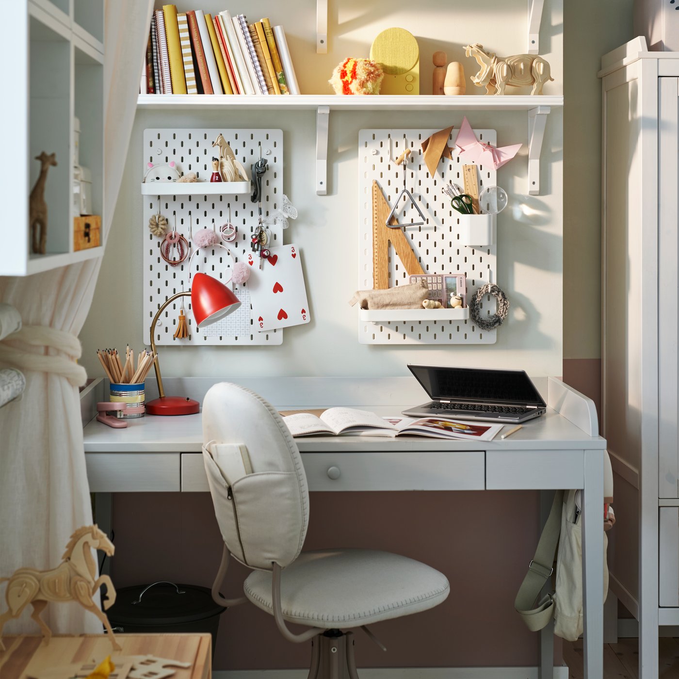 An yellow NATTBAD Bluetooth speaker in the home office