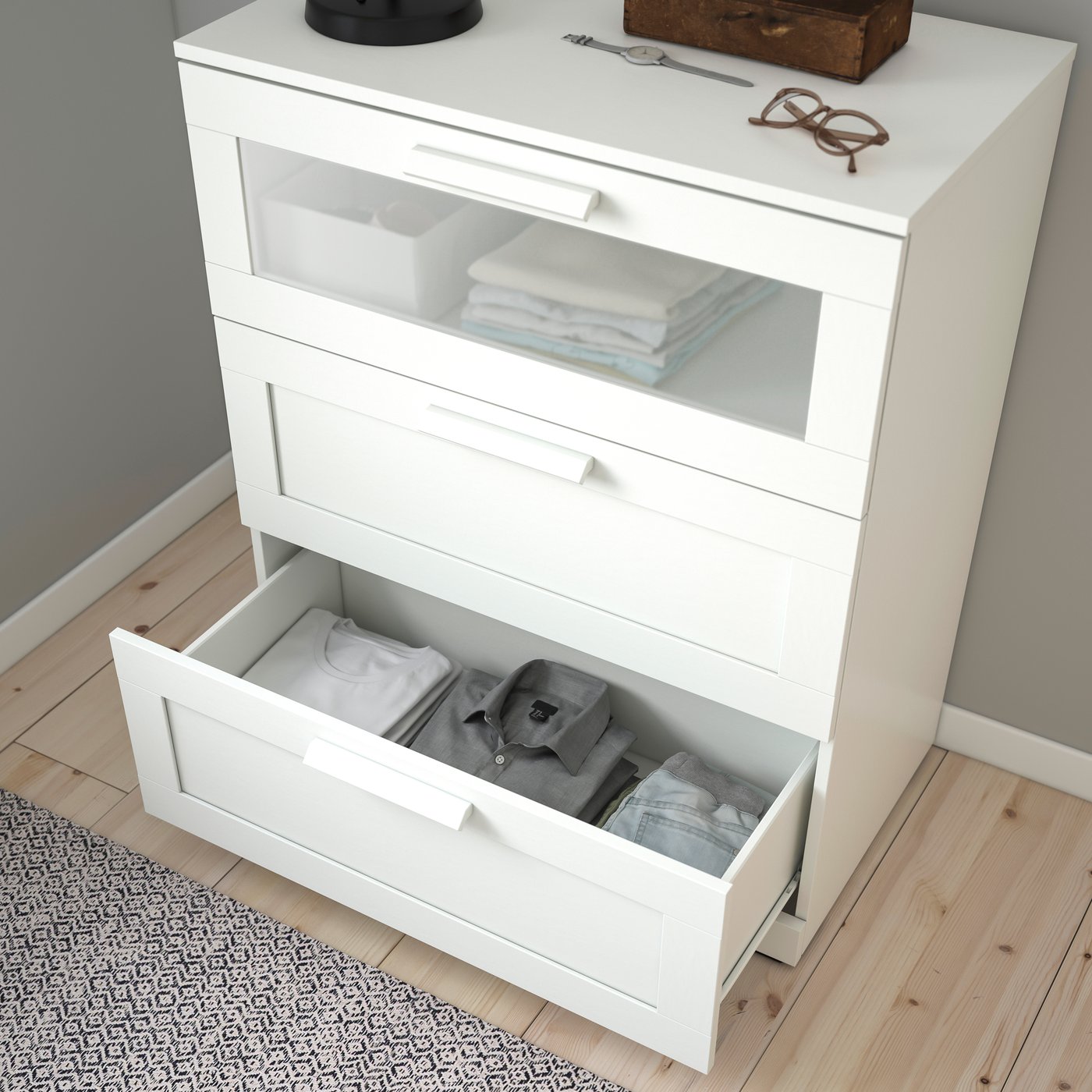 A white/frosted glass BRIMNES chest of 3 drawers