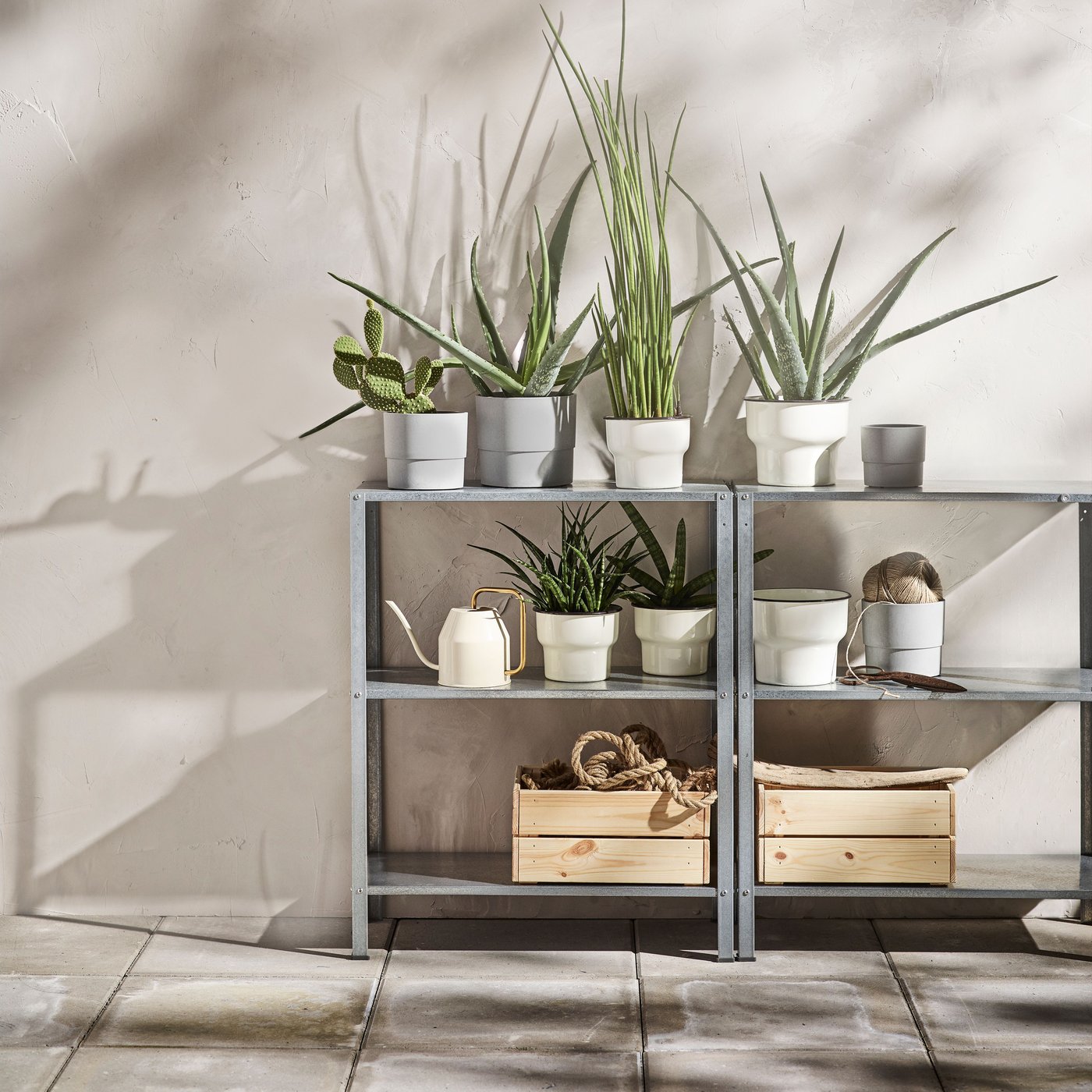 An in/outdoor HYLLIS shelving unit
