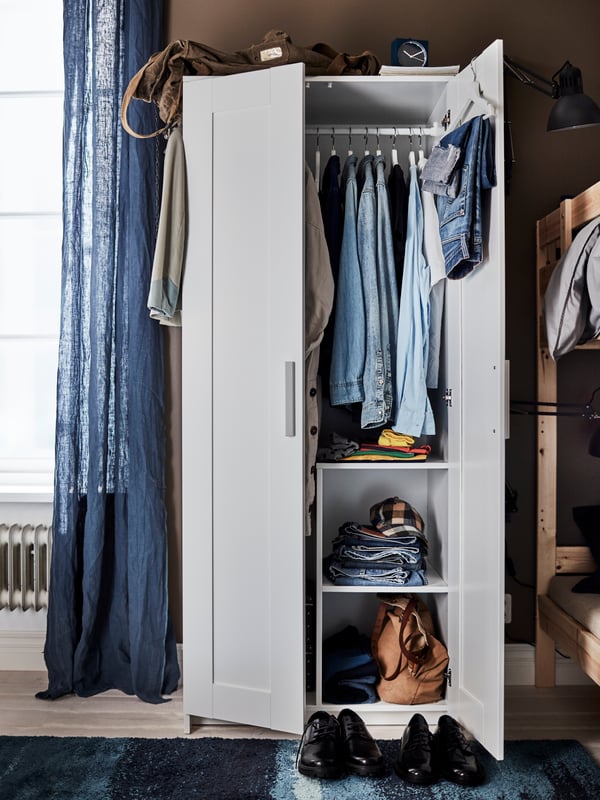 A white BRIMNES wardrobe with 2 doors in the bedroom