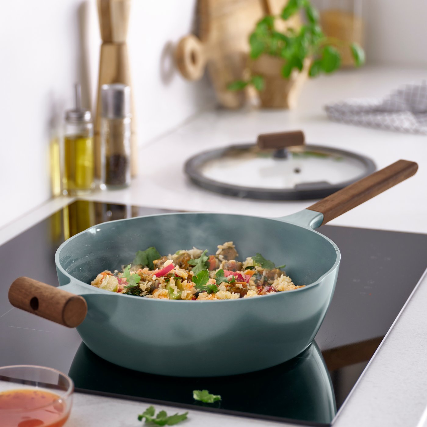 A non-stick coating glass/wood grey-turquoise KLIPPFISK sauté pan with lid