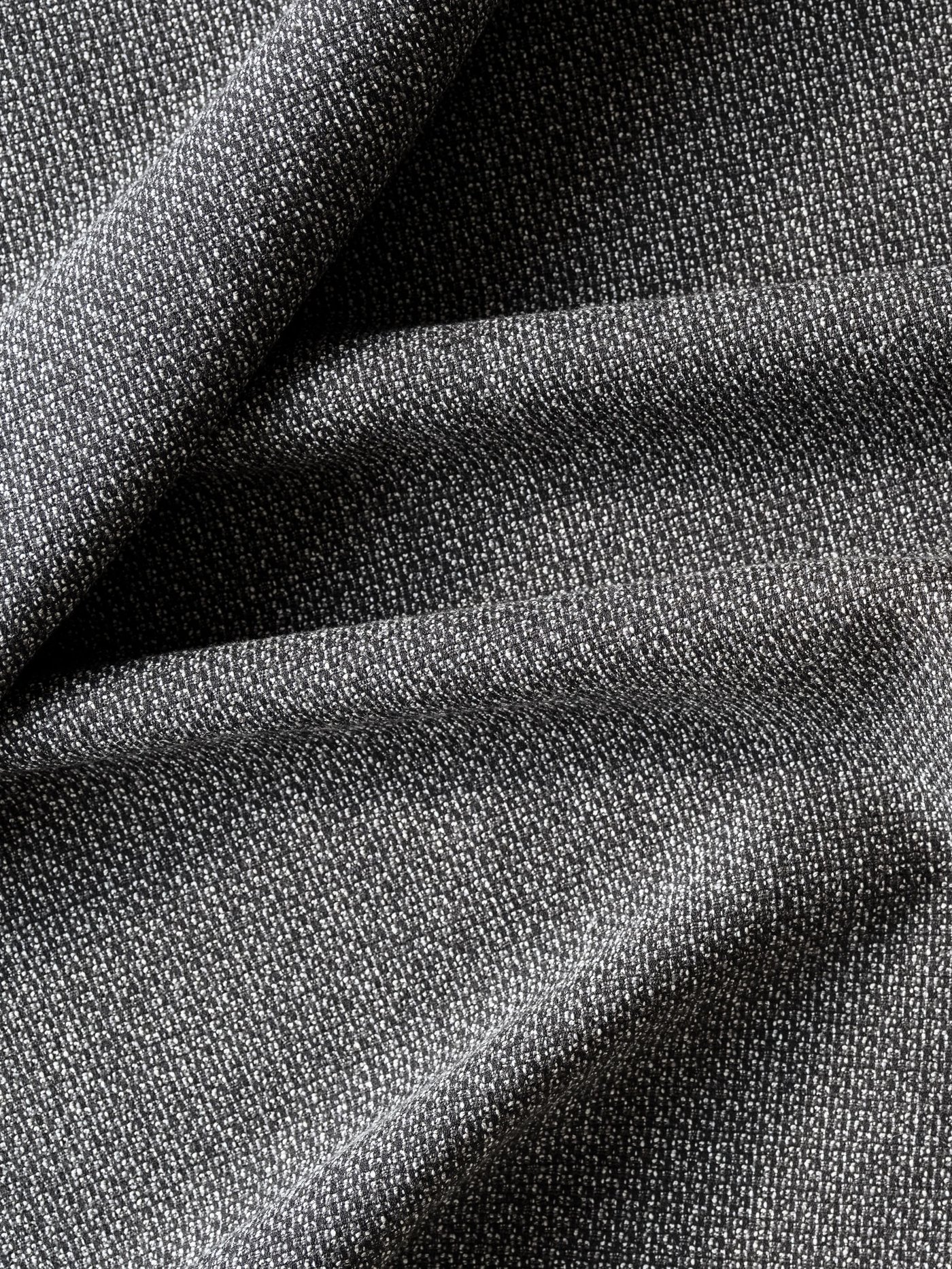 A close-up of a dark grey VIMLE cover for 2-seat sofa.