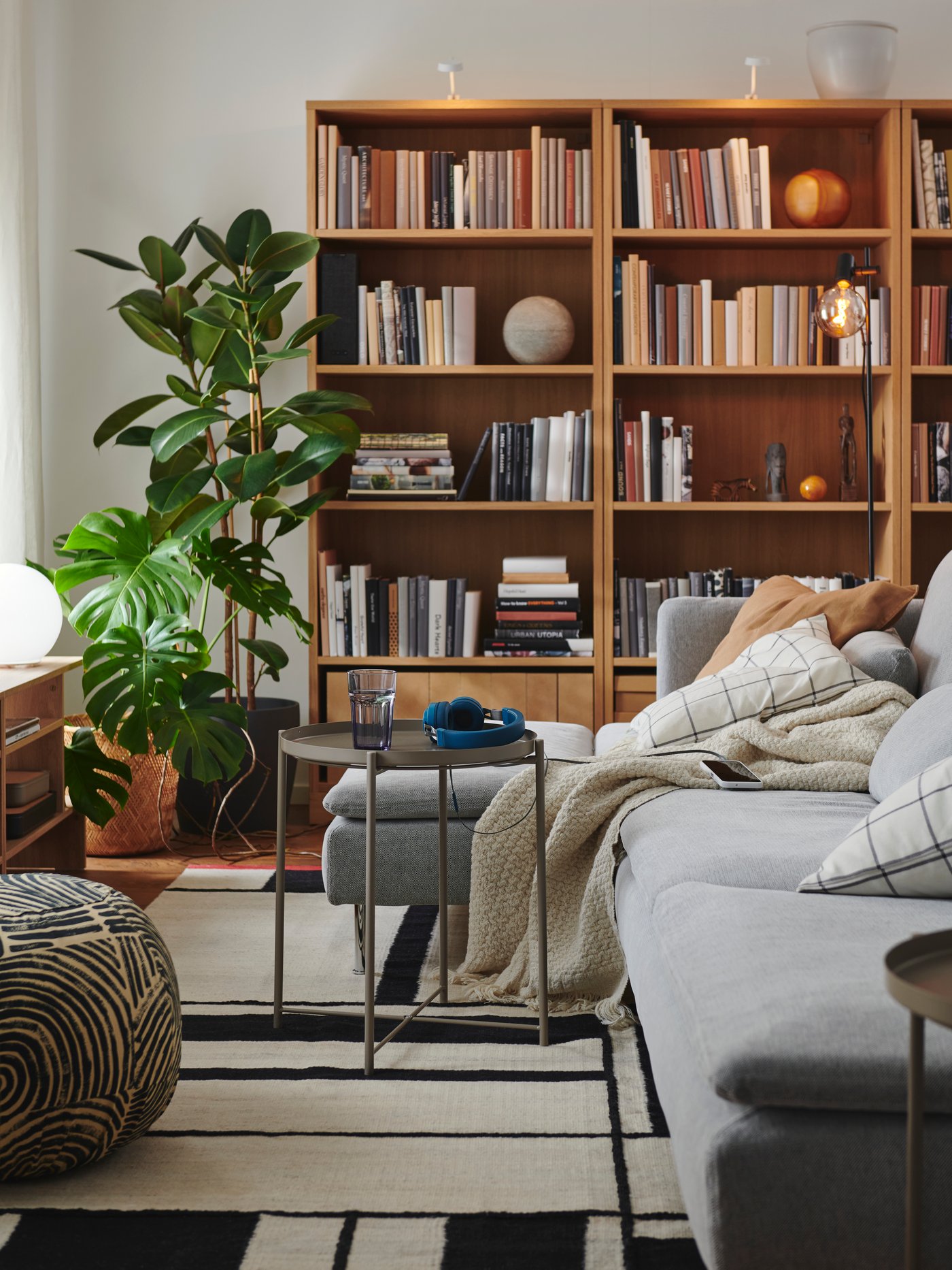 A grey sofa in a small living room