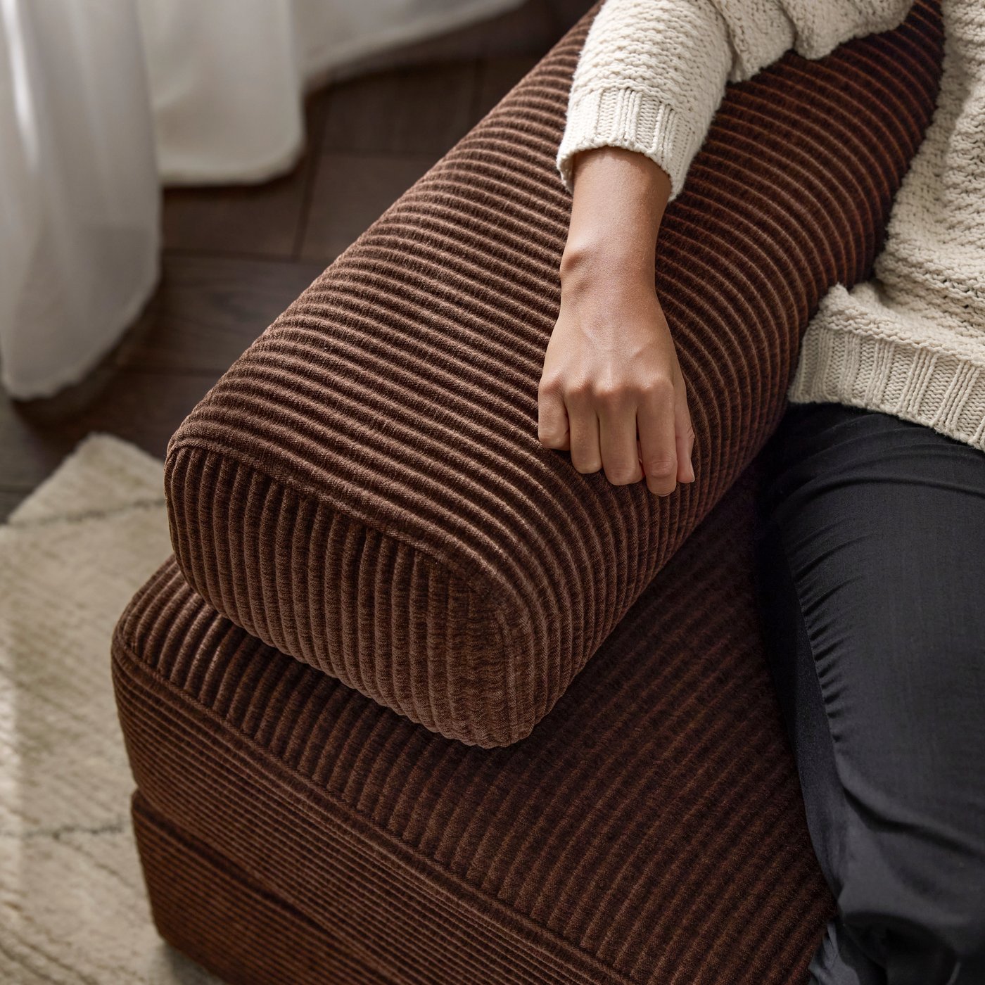 A Samsala dark brown JÄTTEBO cover for headrest cushion