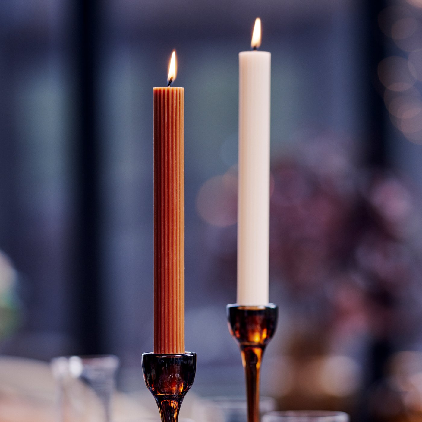 A brown BLOMSTER candlestick in the dining room