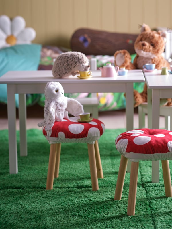 A mixed colours DUKTIG 8-piece cup/saucer playset in the childrens room