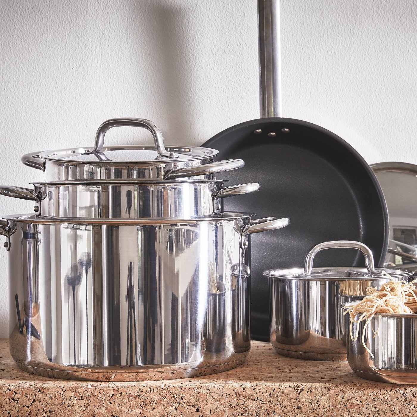 Our IKEA 365+ cookware collection of six stainless steel pots and pans with non-stick coating