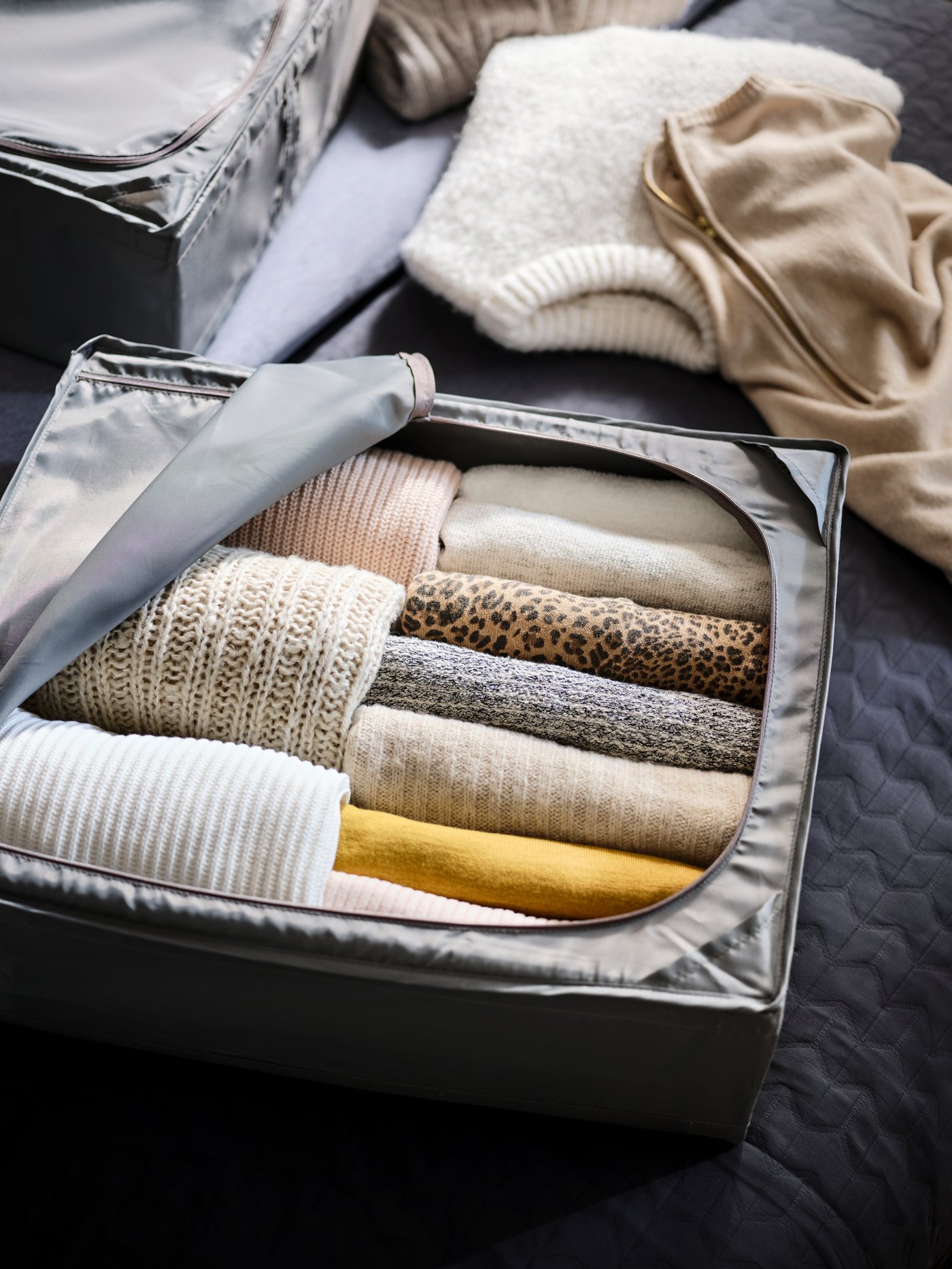 A dark grey SKUBB storage case