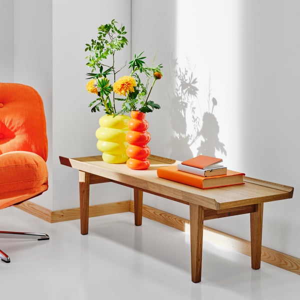 An orange Kelinge DYVLINGE swivel chair