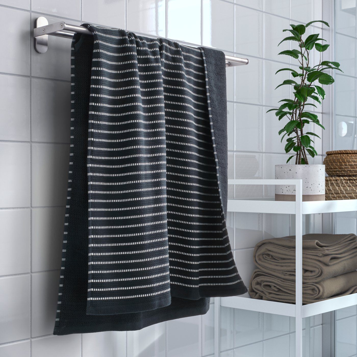 A black BROKGINST bath towel