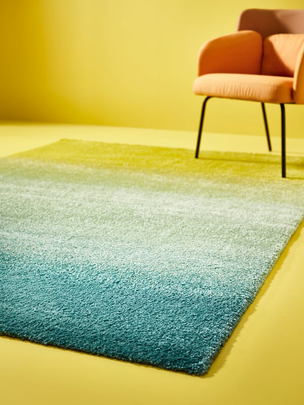 A blue/green yellow HOTELLRUM rug, high pile