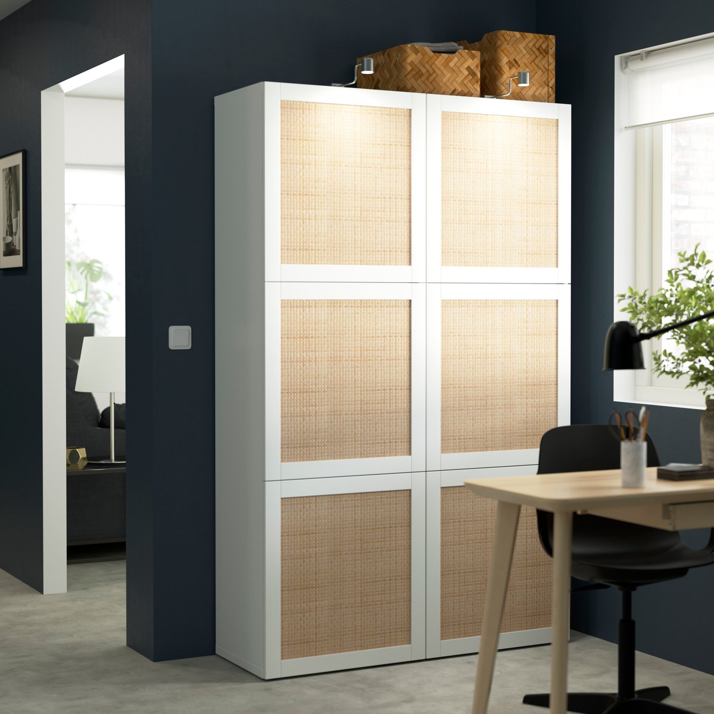 A white Studsviken/white woven poplar BESTÅ storage combination with doors