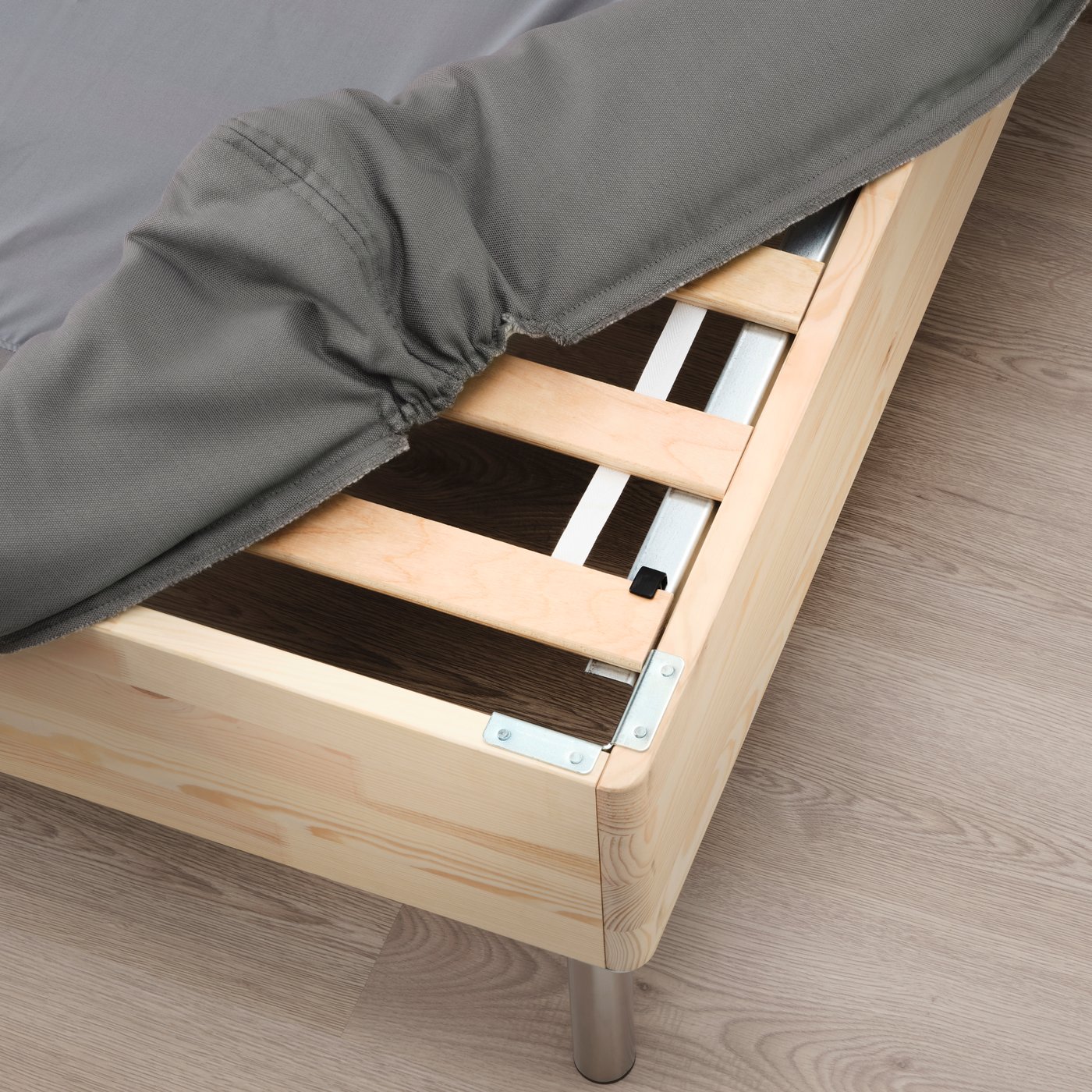 A dark grey LYNGÖR slatted mattress base with legs