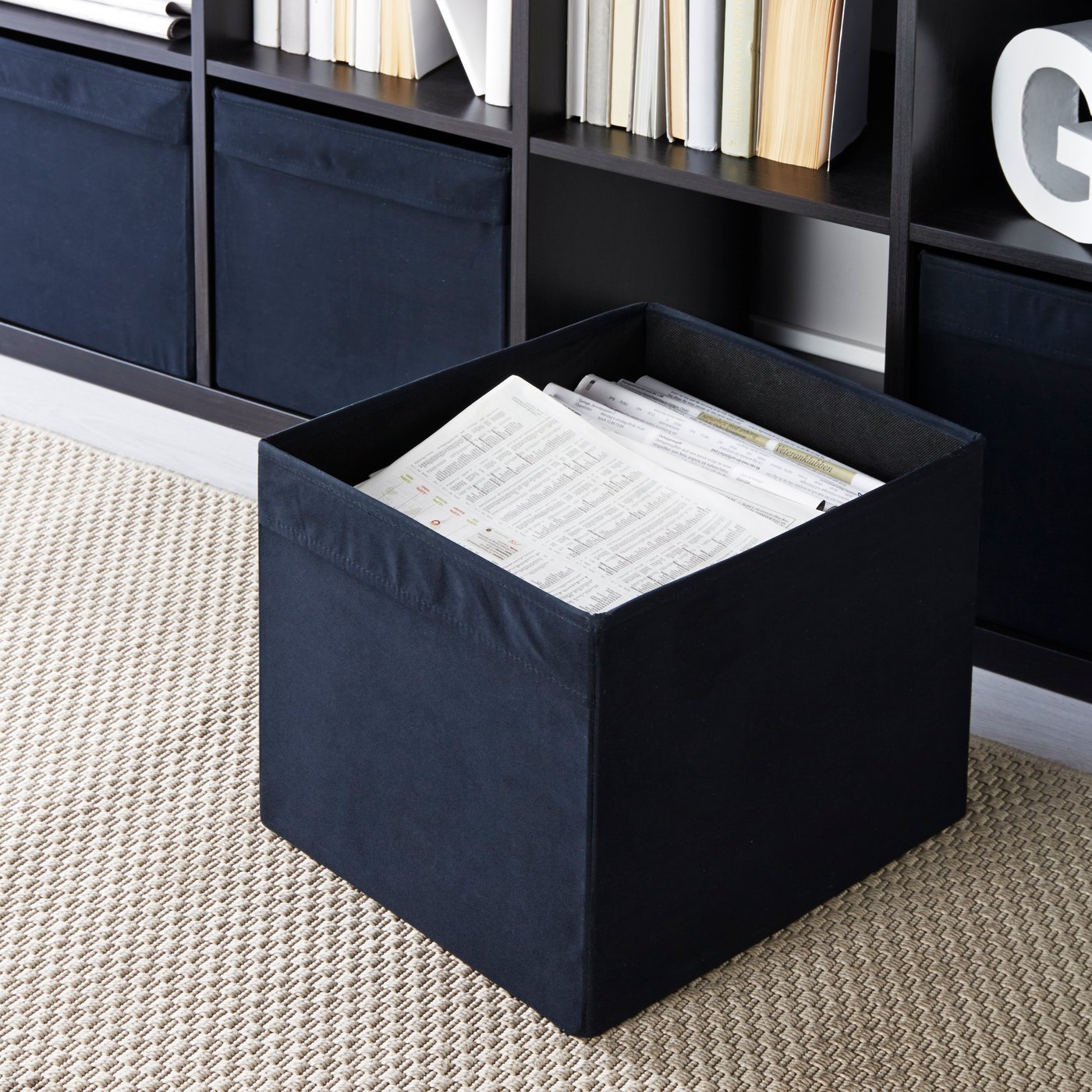 A black DRÖNA box in the living room