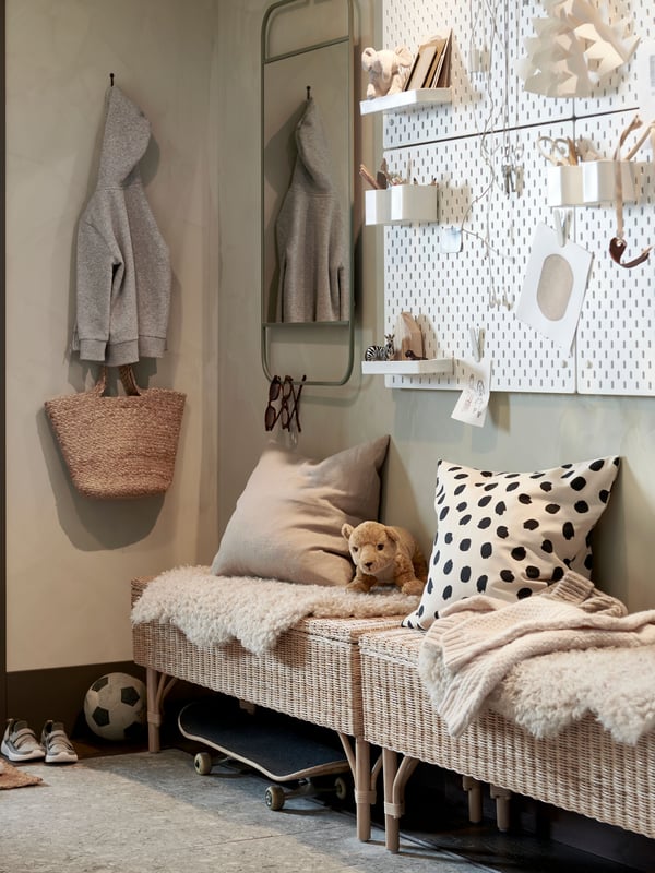 A handmade rattan TOLKNING bench with storage