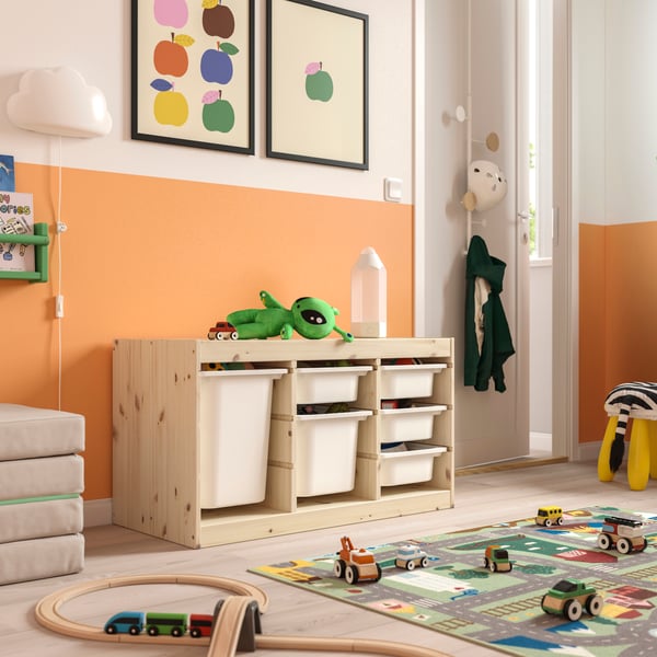 A light white stained pine TROFAST frame in the childrens room