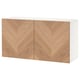 BESTÅ storage unit, light wood herringbone pattern, rectangular shape, white top.