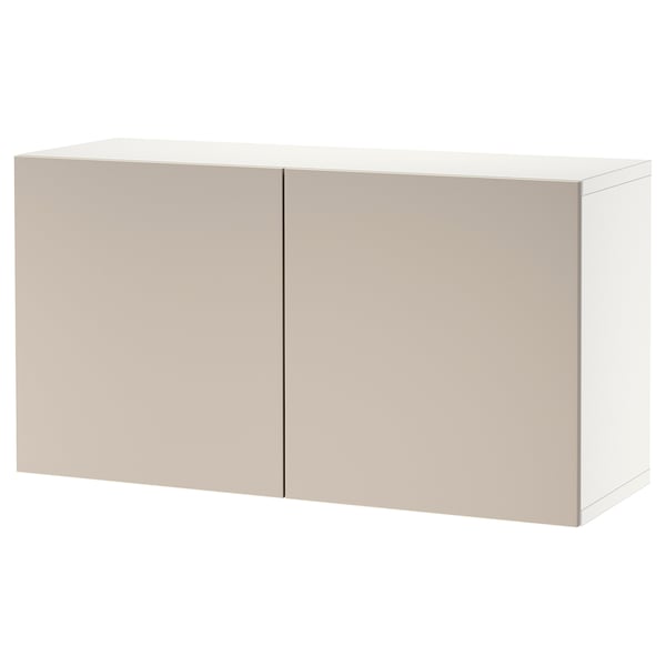 Beige BESTÅ storage unit with 2 simple doors for organised storage.