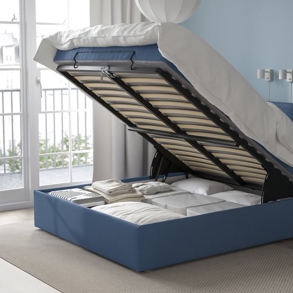 BLÅFJÄLLET divan bed with storage ottoman and lift mechanism.