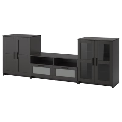 Three-piece BRIMNES tv unit in black; includes open drawers and glass doors, modern design with sleek lines.