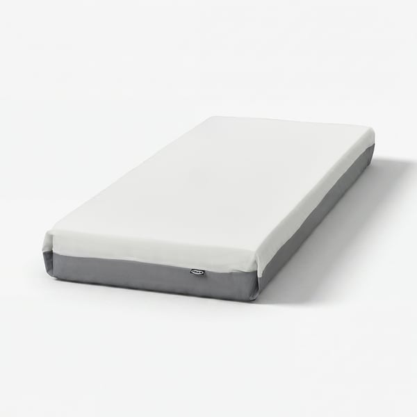 FÄGERÅSEN: white mattress, rectangular, with grey trim and foam top.