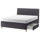 A dark grey IDANÄS bed with a curved headboard and storage drawers.