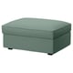 A KIVIK footstool, rectangular, in light green, with a soft, washable fabric cover.