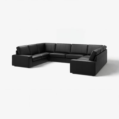 Large black leather sectional sofa with deep seating and low armrests, ideal for relaxation.