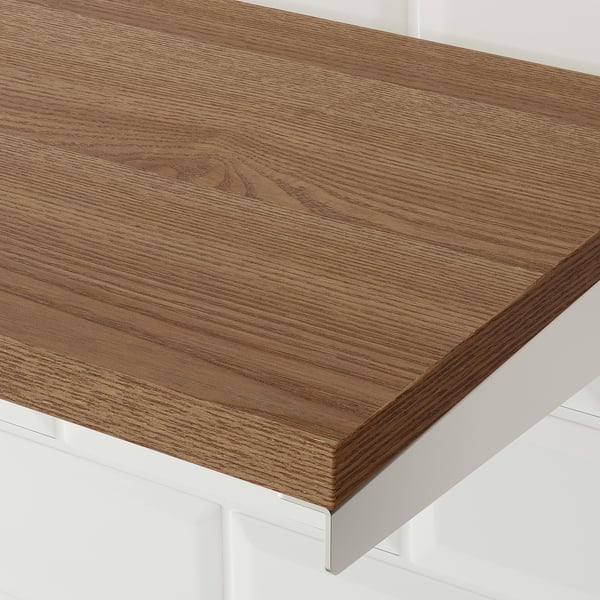 Smooth wooden surface, light brown finish, supported by metal brackets.