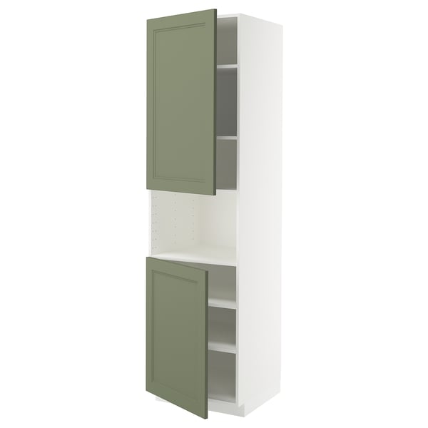 Green-white METOD kitchen cabinet with adjustable shelves.