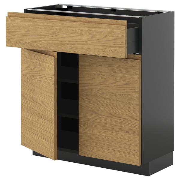 Modern kitchen cabinet: METOD with oak-wood finish, black base, open drawer, and doors.
