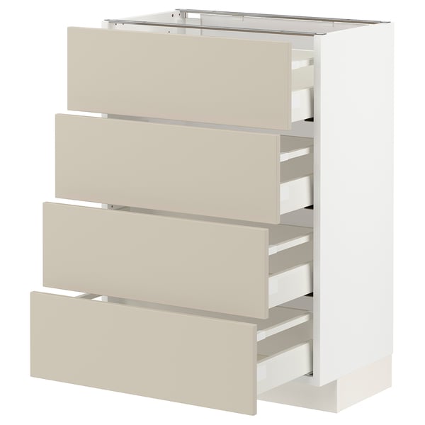White METOD kitchen unit with beige drawers.