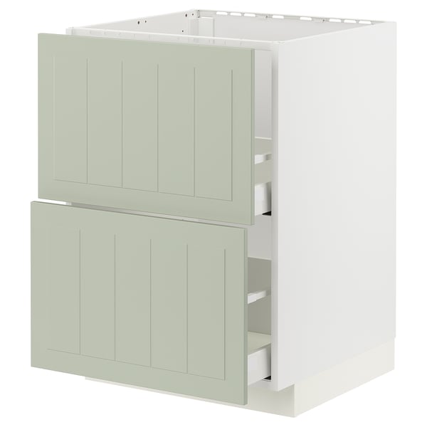 Green METOD kitchen cabinet with crafted look and mixed materials.