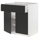 Modern black and white kitchen cabinet with a sleek, minimalist design and integrated handle.