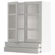 White ikea METOD kitchen unit with glass doors and drawers.